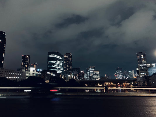Street view of Tokyo at night showing restaurants and bars in Japan